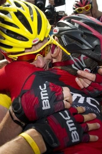 Hugs for Tour de France winner Cadel Evans (BMC)