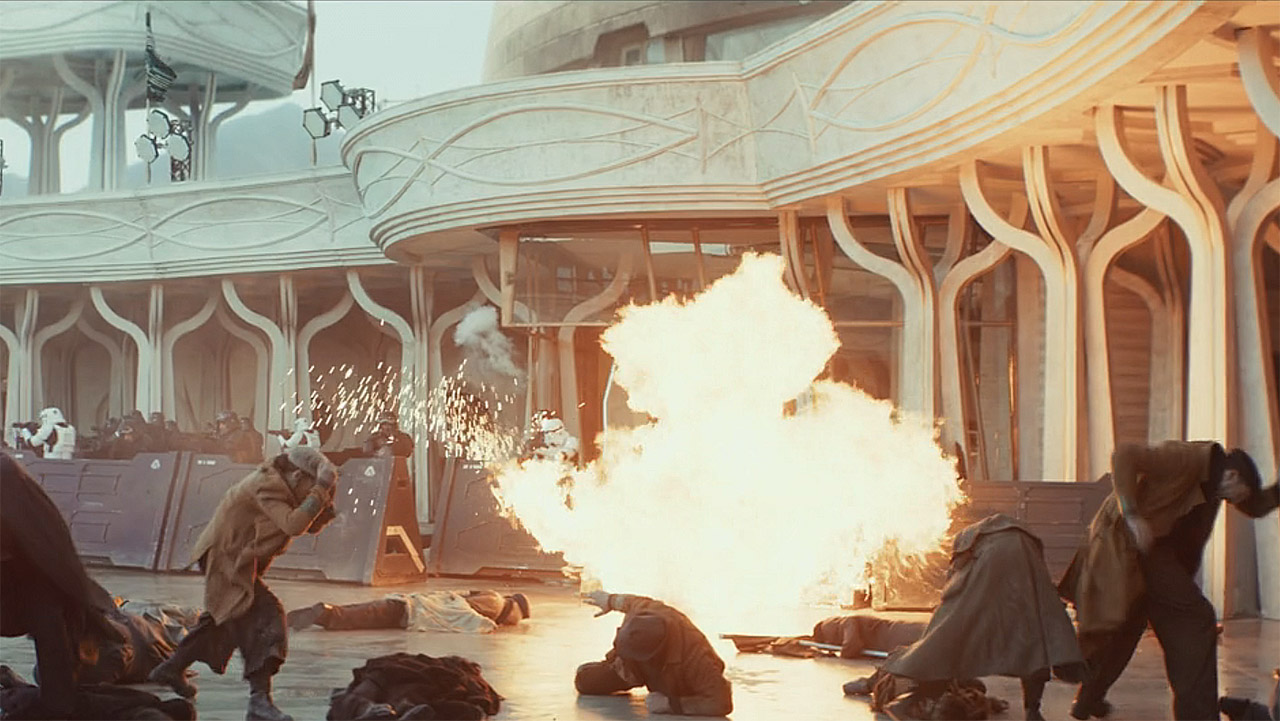 An explosion going off with people surrounding it in Andor season 2 episode 8
