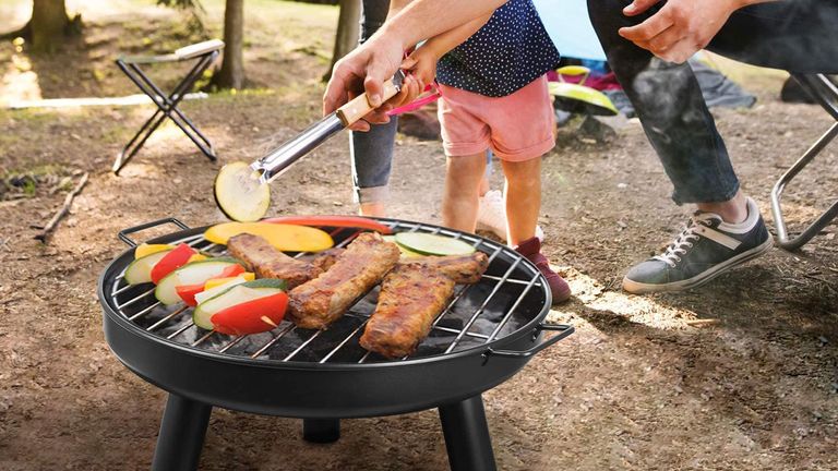 This fire pit doubles up as a bbq and is under £50 - snap ...