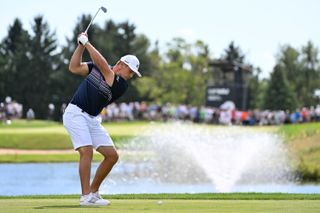Bryson DeChambeau hits a golf shot