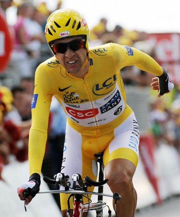Sastre gave a brief wave as he crossed the line.