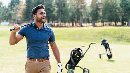 Man with a trim stomach playing golf