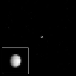 NASA's Dawn spacecraft acquired this image of the dwarf planet Ceres on Dec. 1, 2014. A cropped, magnified view of Ceres appears in the inset at lower left.