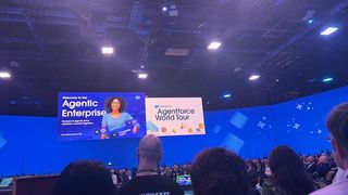 Salesforce World Tour stage with TV screen header