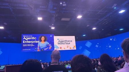 Salesforce World Tour stage with TV screen header
