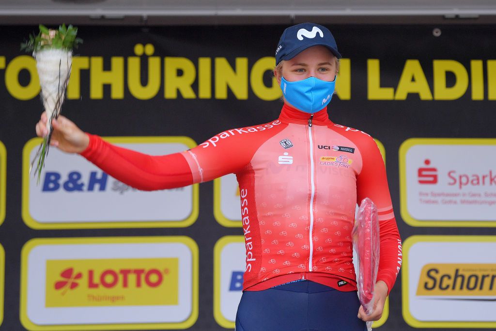 GERA GERMANY MAY 26 Emma Norsgaard Jorgensen of Denmark and Movistar Team red best young jersey celebrates at podium during the 34th Internationale LOTTO Thringen Ladies Tour 2021 Stage 2 a 1251km stage from Gera to Gera Mask Covid safety measures ltlt2021 lottothueringenladiestour womencycling on May 26 2021 in Gera Germany Photo by Luc ClaessenGetty Images