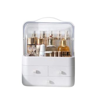 A product image of a white makeup organiser with three drawers at the bottom.