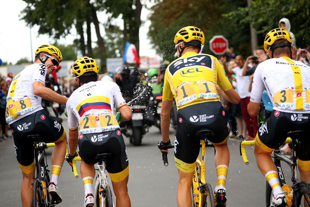 Sky celebrate at the back of the peloton