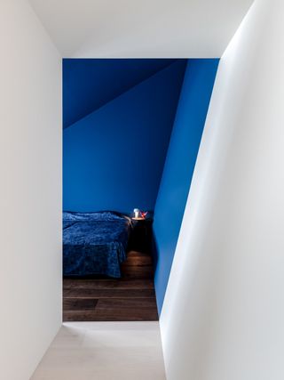 blue bedroom at terada house in Tokyo