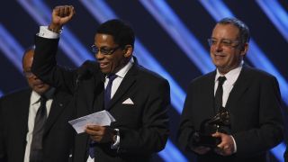 The 2008 Winner of the Album of the Year Herbie Hancock (C) reacts on stage with producers Larry Klein (R) and Quincy Jones (R) during the 50th Grammy Awards in Los Angeles on February 10, 2008.