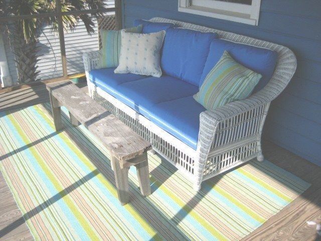 Outdoor Patio With A Couch And Rug