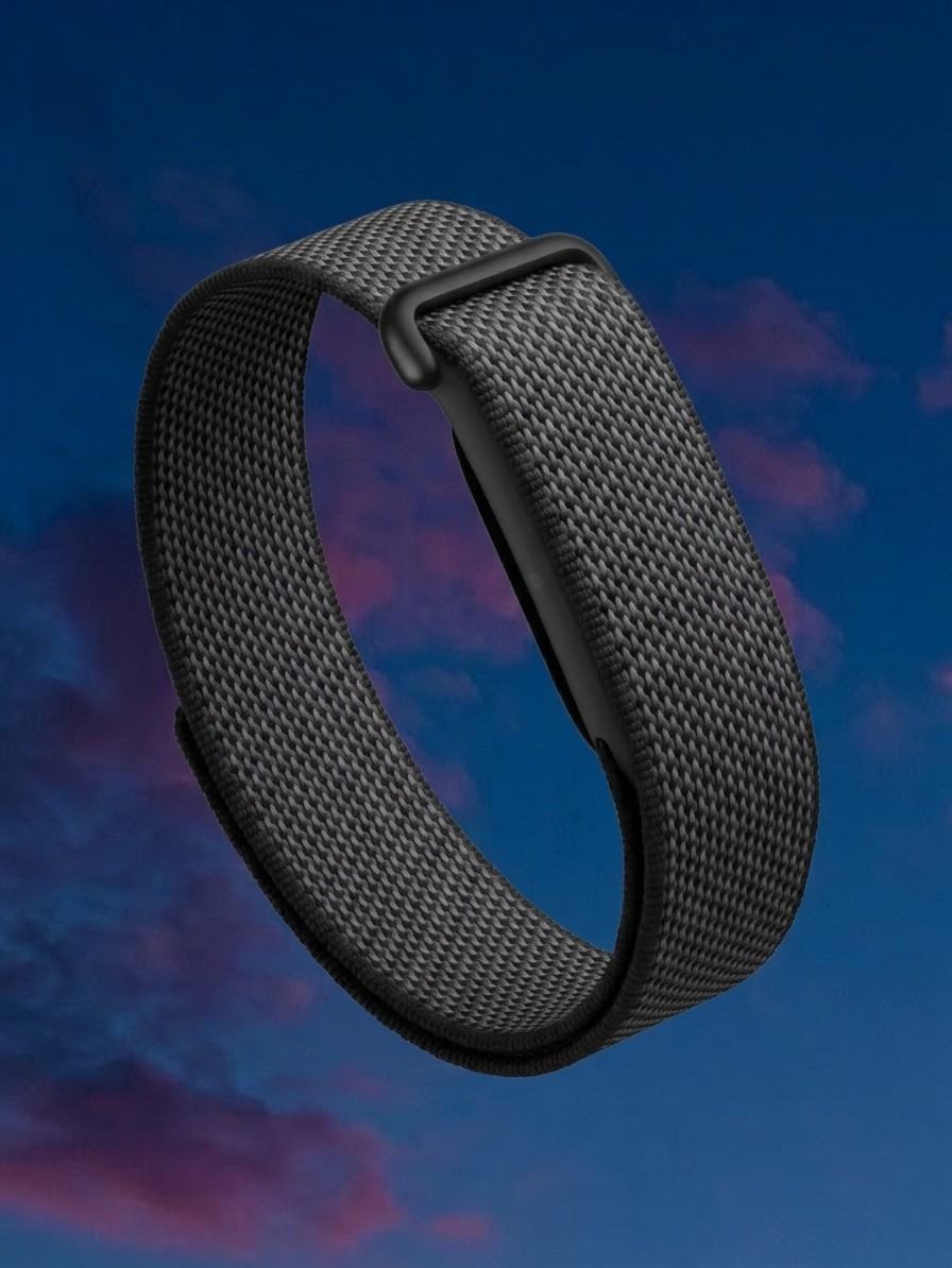 The FitBit Air against a background of a dark sky edited by Gemini