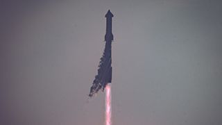 a rocket launches into a gray sky