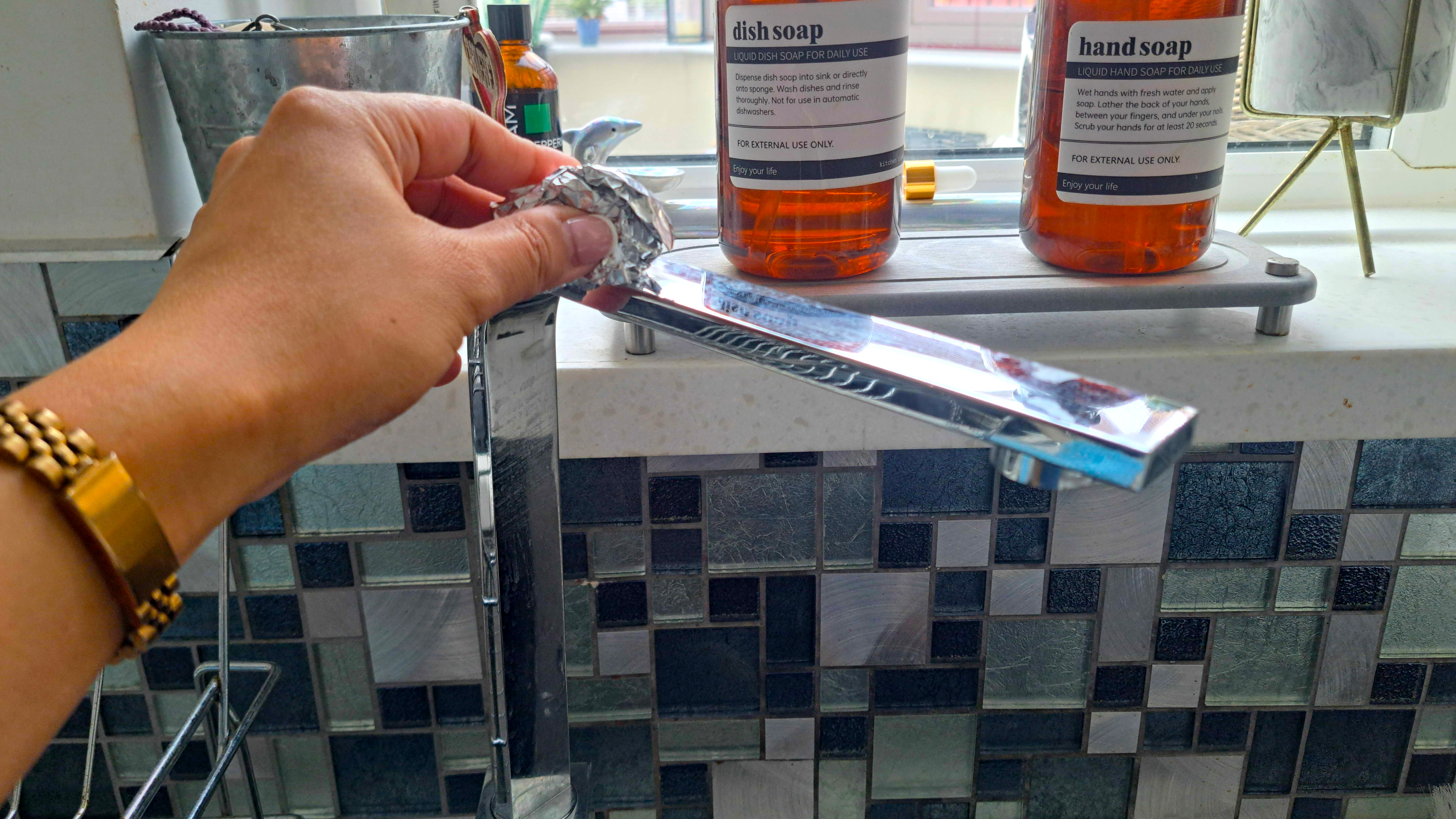 Cleaning faucet with foil