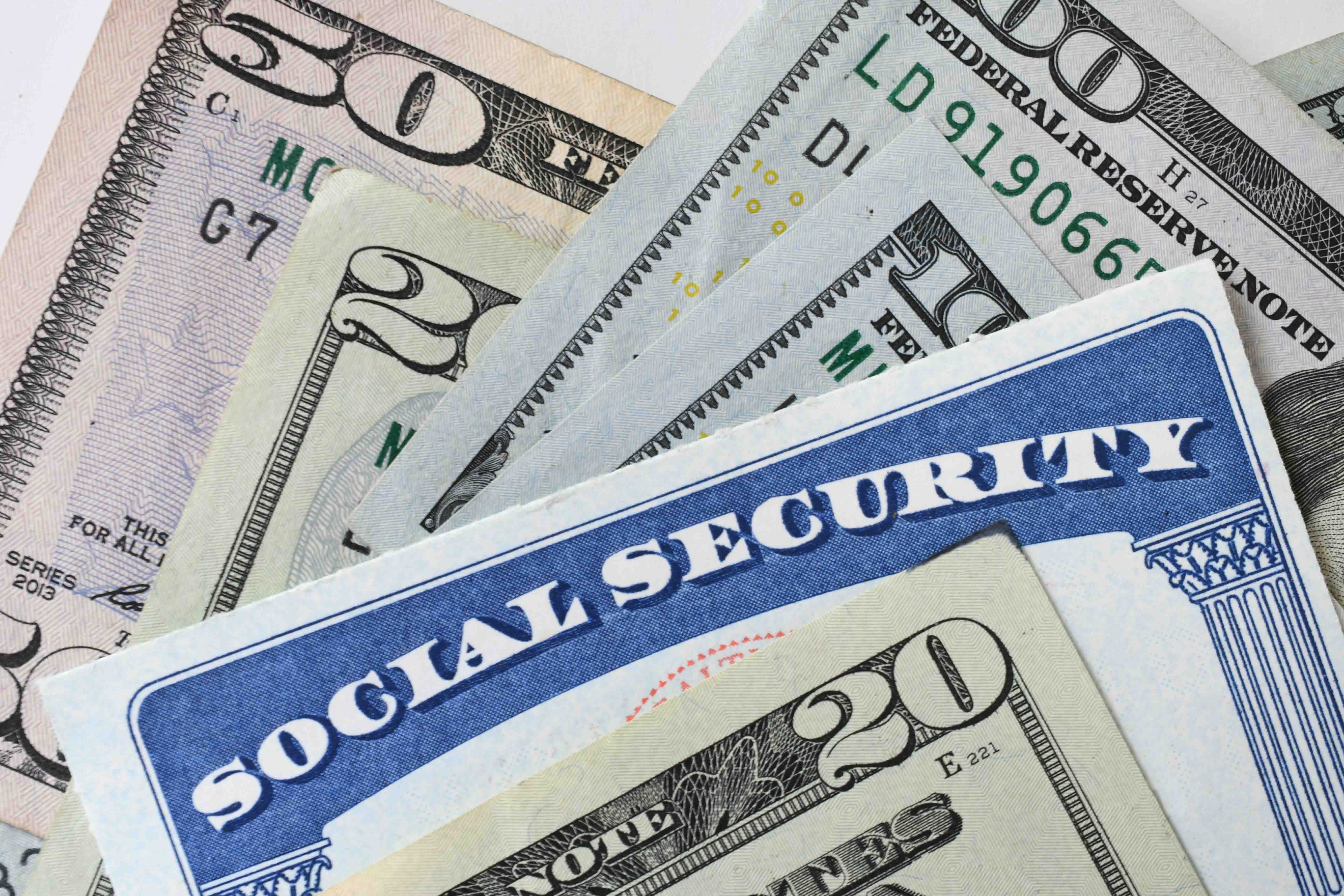 Photo of Social Security card and paper currency