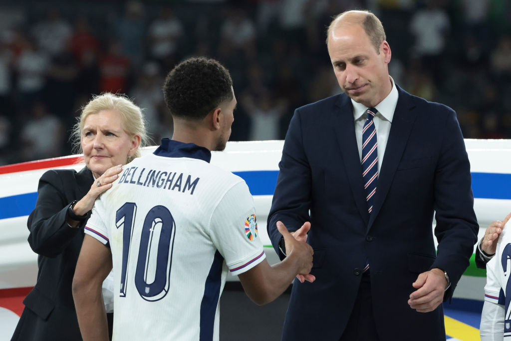 BERLIN, GERMANY - JULY 14: FA Chair Debbie Hewitt and Prince William, Prince of Wales with Jude Bellingham of England during the trophy ceremony following the UEFA EURO 2024 final match between Spain and England at Olympiastadion on July 14, 2024 in Berlin, Germany. (Photo by Jean Catuffe/Getty Images)