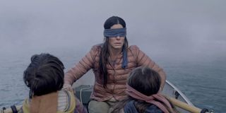 Vivien Lyra Blair, Julian Edwards, and Sandra Bullock in Bird Box