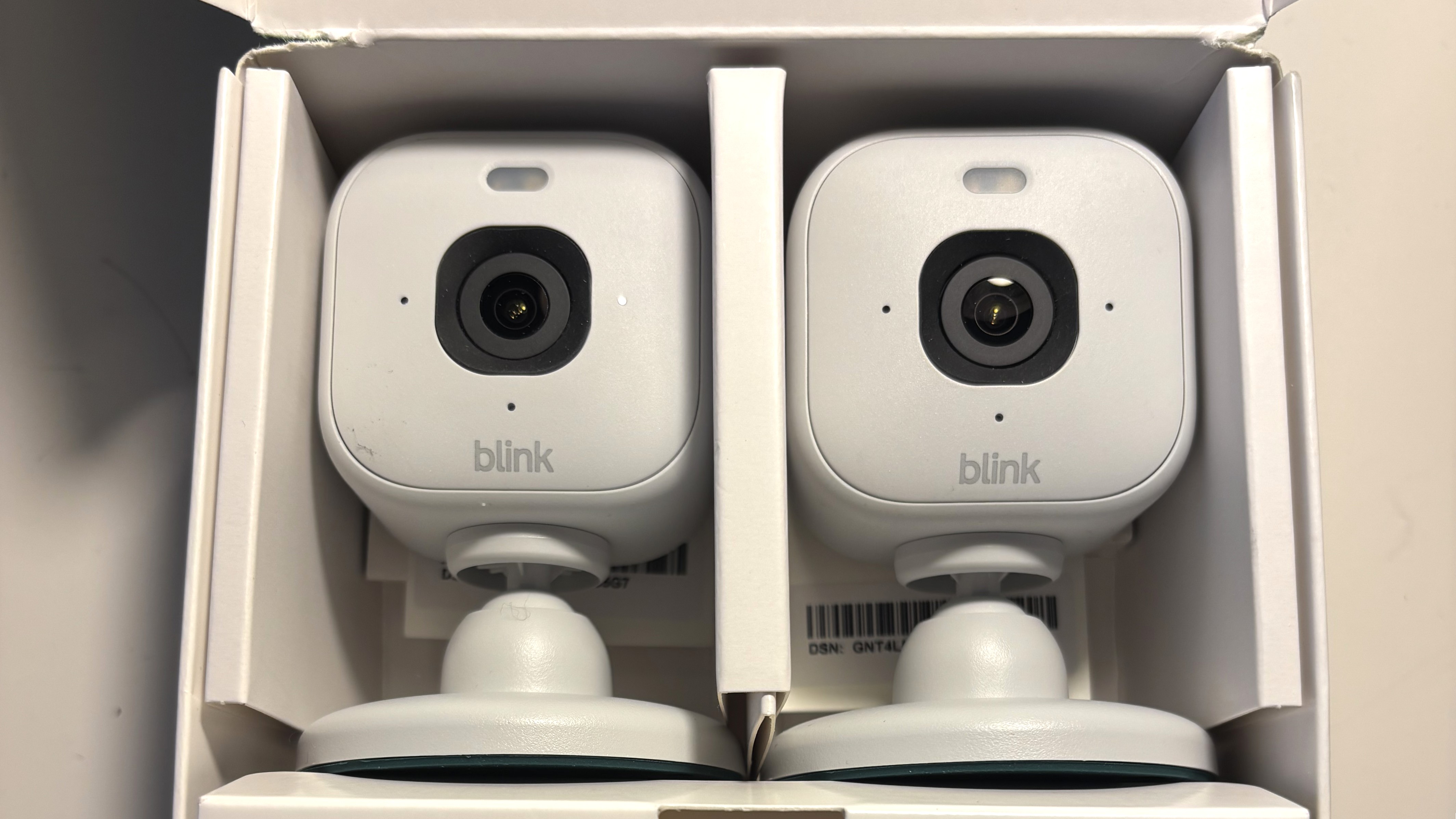 Two Blink Mini 2 security cameras in box