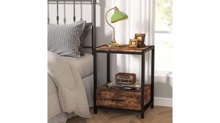 Vintage Nightstand With Drawers And Storage Shelf, Industrial End Table, in a living space next to a gray bed, in front of a window and on top of a wooden floor