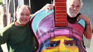 Actors Cheech Marin (L) and Tommy Chong attend a signing of a Gibson Art Guitar for GuitarTown Sunset Strip at The Roxy Theatre on November 16, 2010 in West Hollywood, California.