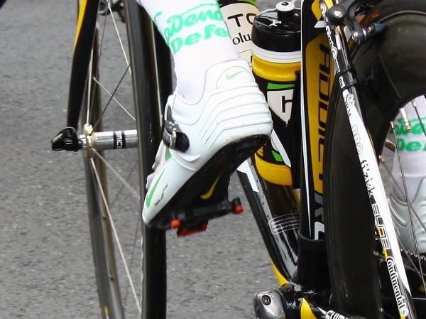 A semi-rigid plastic exoskeleton wraps around the heel and ankle of Mark Cavendish.