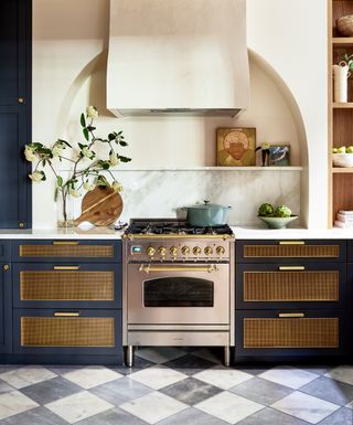 a shaker kitchen with brass insets
