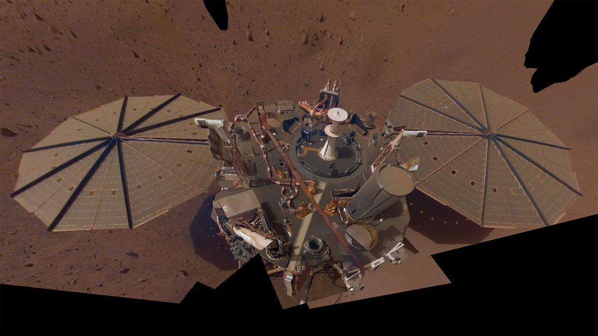 This image, the second selfie captured by NASA&#039;s InSight Mars lander, is a mosaic of 14 photos taken between March 15 and April 11, 2019.