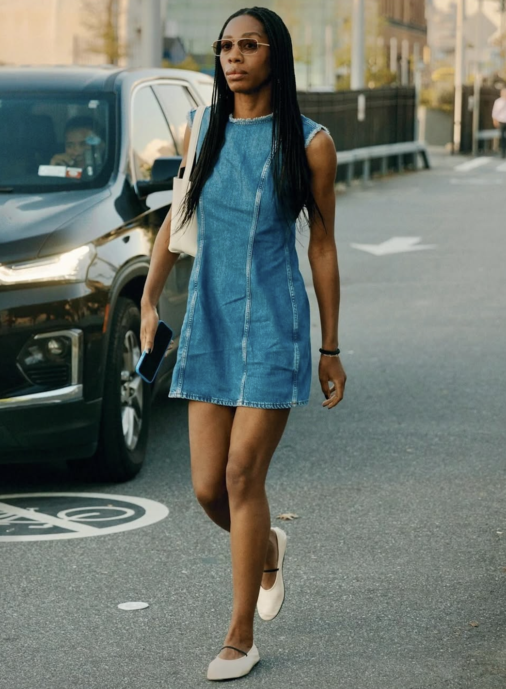louisahatt wears denim mini dress