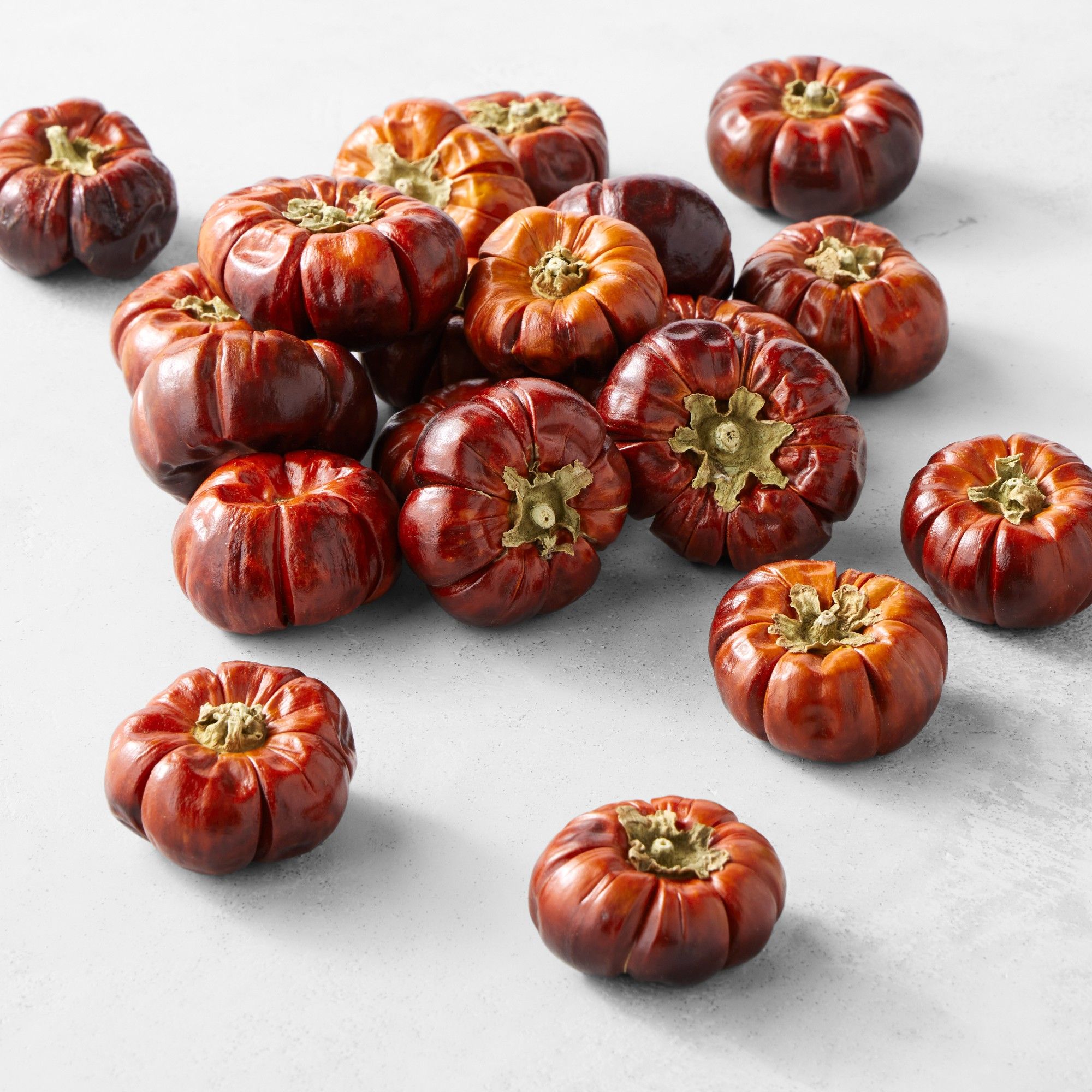 Orange faux mini pumpkins