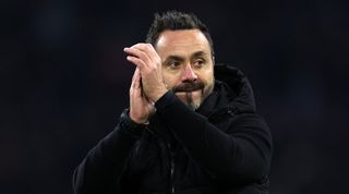 Brighton manager Roberto De Zerbi applauds the fans after the Seagulls' win over Ajax in November.