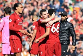 Liverpool’s win over Wolves was not enough for the Reds players to celebrate winning the title which went to Manchester City