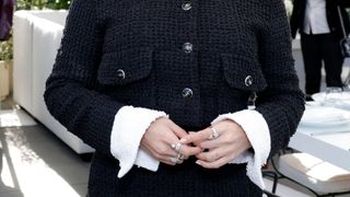 Selena Gomez at a Chanel event showing her nails