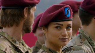 Christina Ochoa smiling, wearing a military beret in Valor