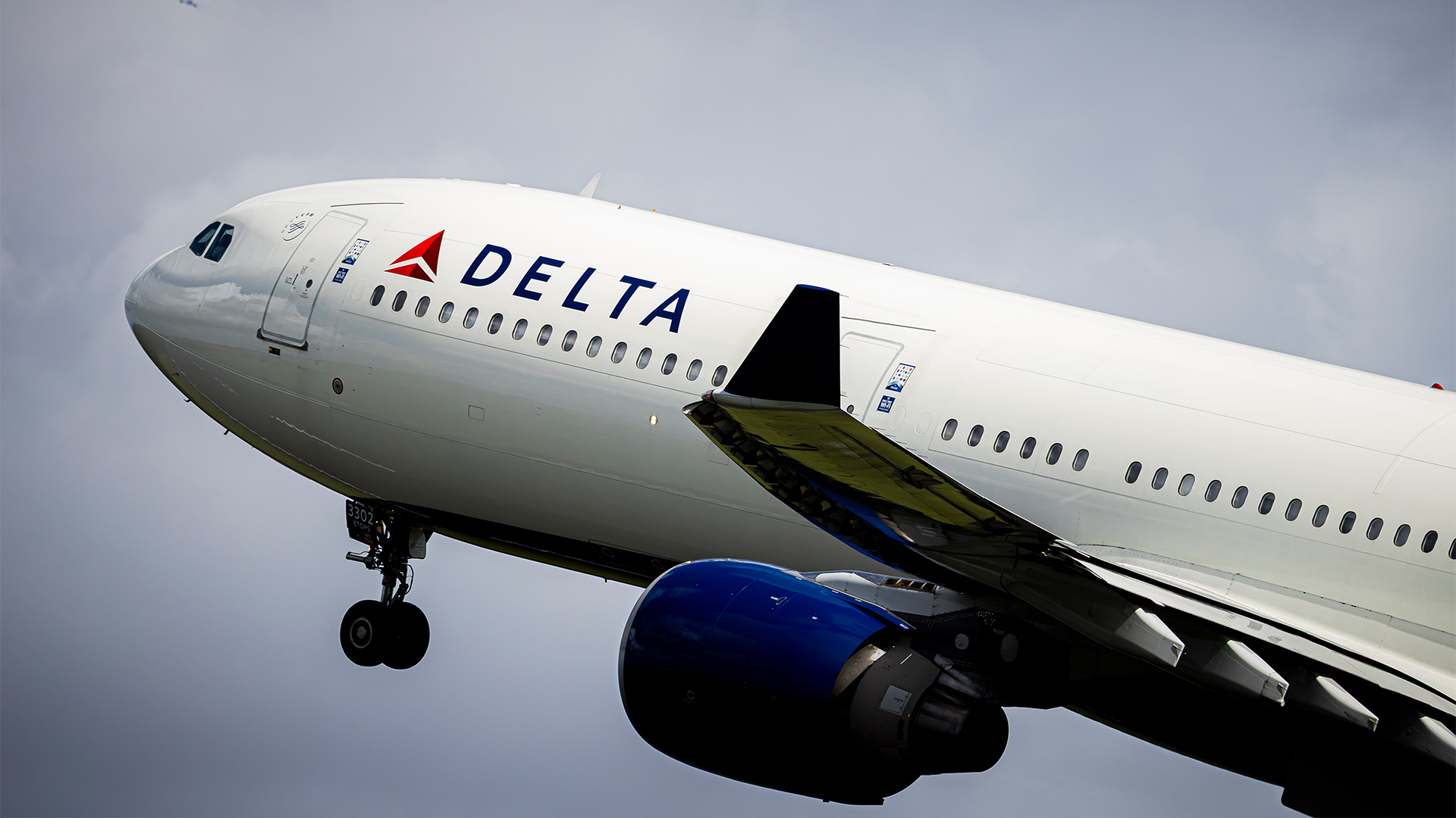 Delta Airlines plane during take off at Schiphol Amsterdam Airport on March 26, 2026 in Schiphol, Netherlands.
