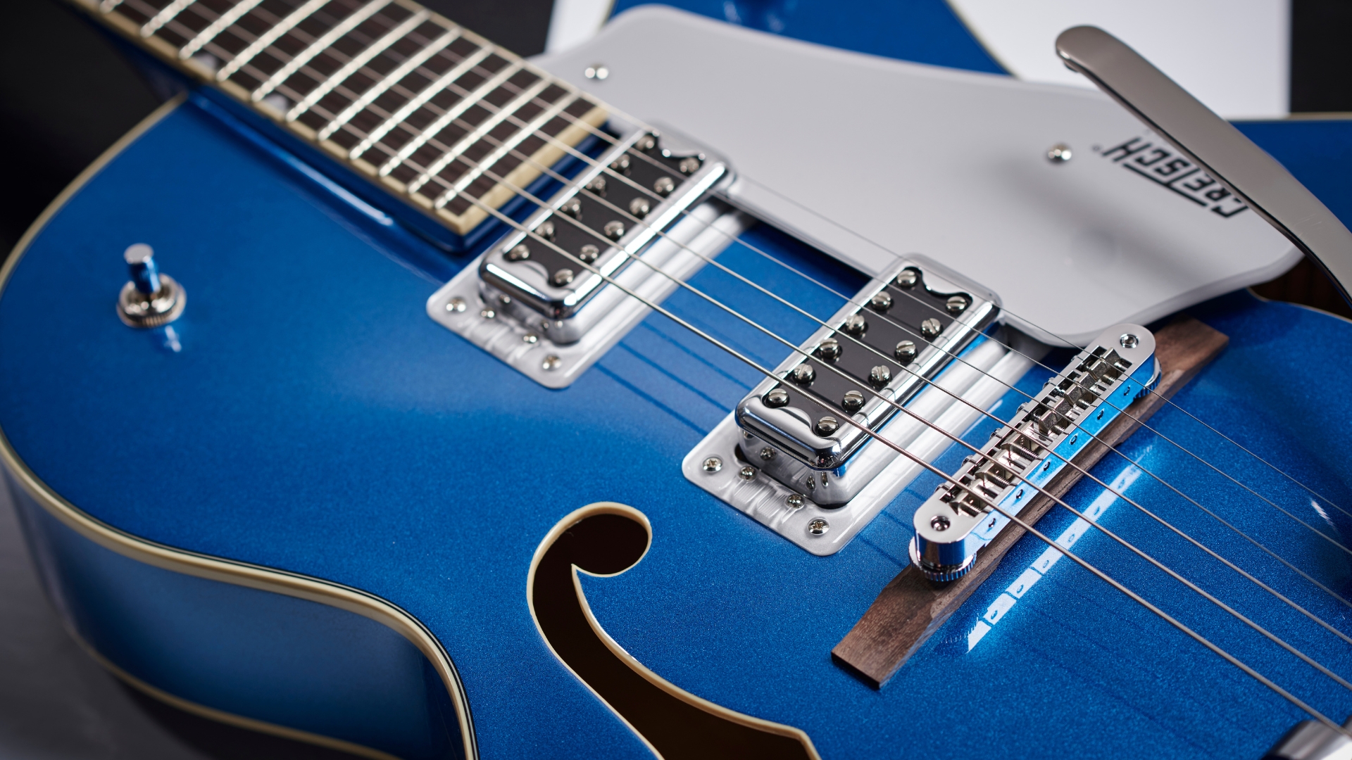 Close up of the humbuckers on a Gretsch G5420T electric guitar