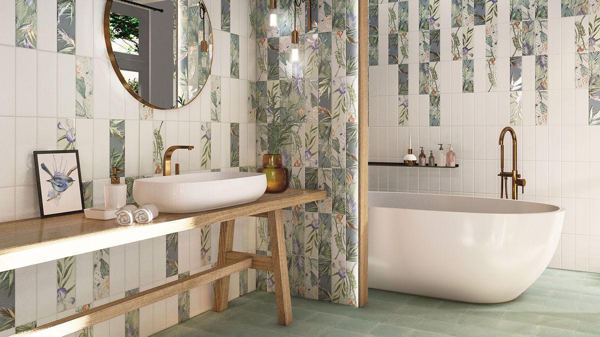 bathroom with countertop basin and freestanding bath