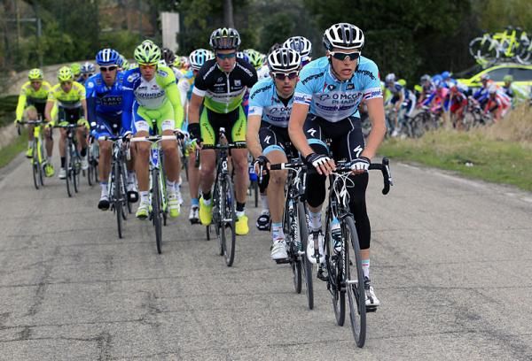 Omega Pharma-Quickstep team members set tempo in the peloton.
