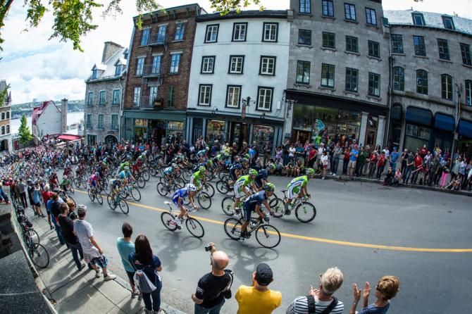 The peloton climbs the Cote de la Montagne, the steepest ascent on Quebec's 12.6km circuit