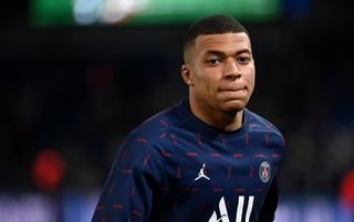 PSG forward Kylian Mbappe warming up before a match