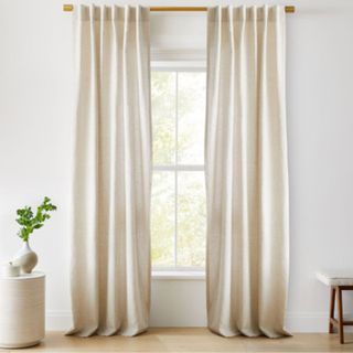 European Flax Linen Curtain against a white wall.