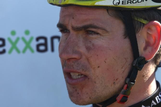 Robert Mennen of Topeak-Ergon Racing talks to the media after finishing second during stage 6