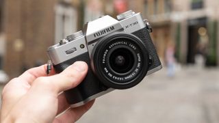 Fujifilm X-T30 III camera held in a hand