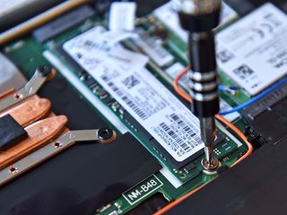 A single screw holds the SSD in place.