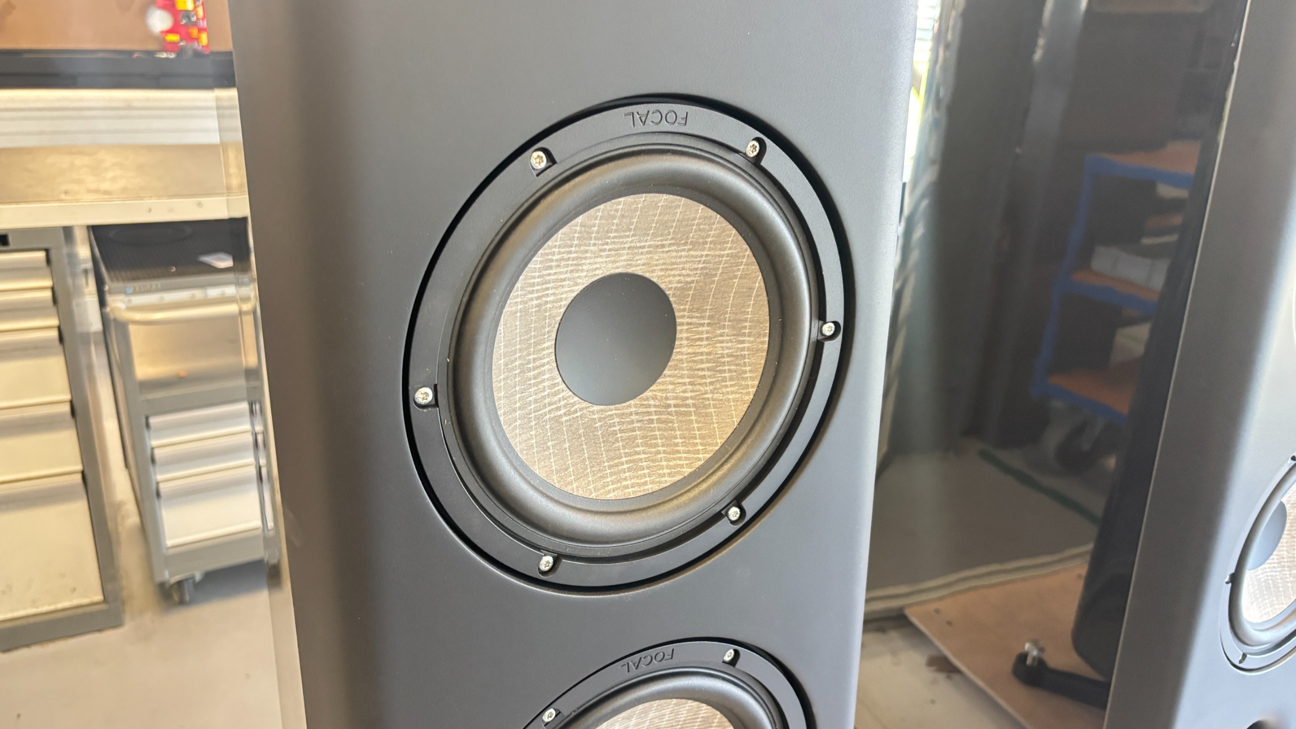 Focal speaker cabinets with a close-up of flax drive units