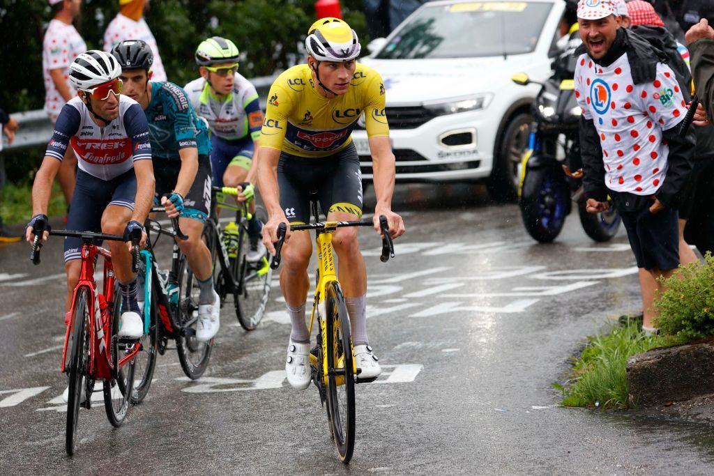 Team Alpecin Fenix Mathieu van der Poel of Netherlands R wearing the overall leaders yellow jersey rides during the 8th stage of the 108th edition of the Tour de France cycling race 150 km between Oyonnax and Le GrandBornand on July 03 2021 Photo by Thomas SAMSON AFP Photo by THOMAS SAMSONAFP via Getty Images