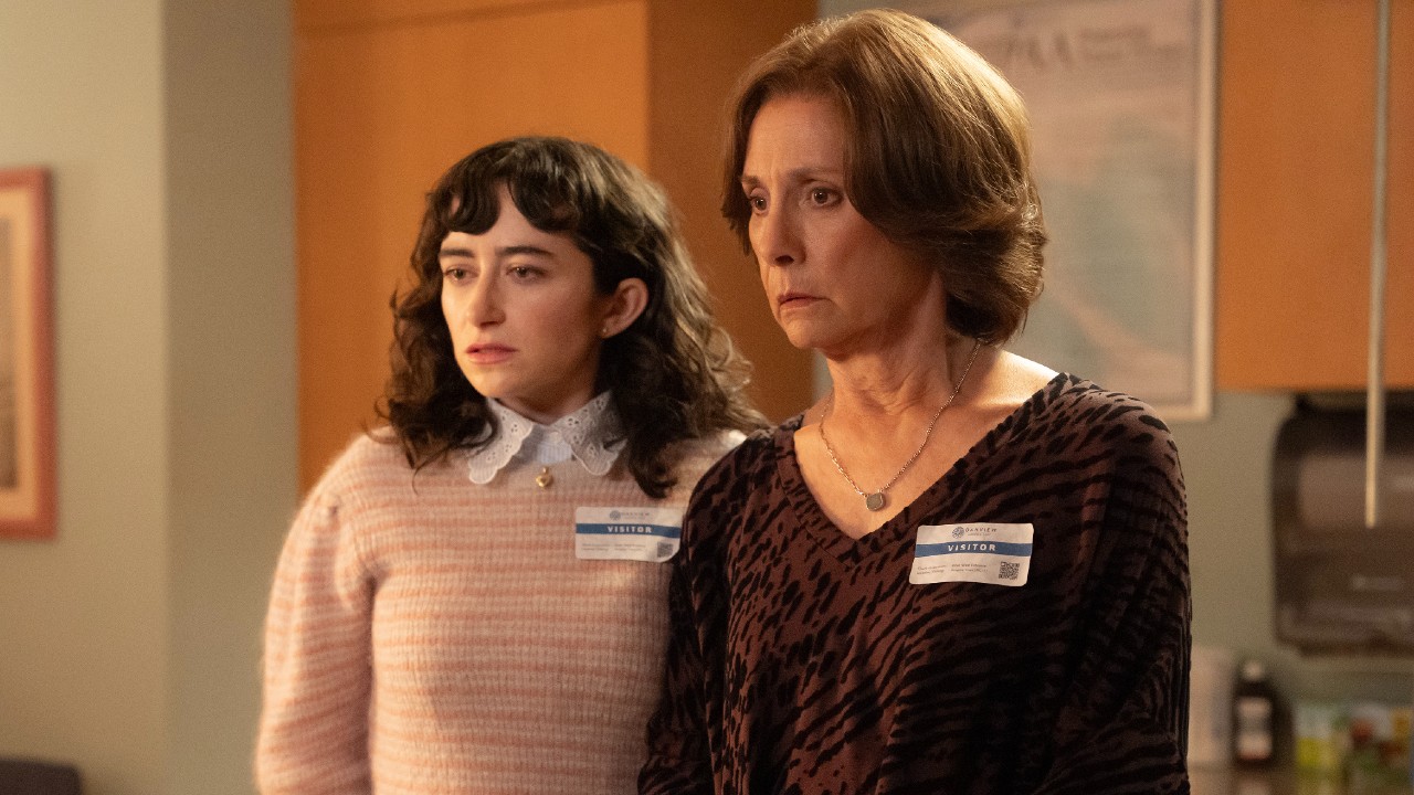 L to R Abby Quinn as Natalie and Laurie Metcalf as Linda standing in a hospital.