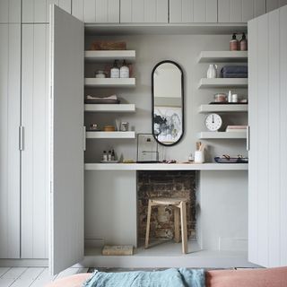 white wardrobe with stool and mirror