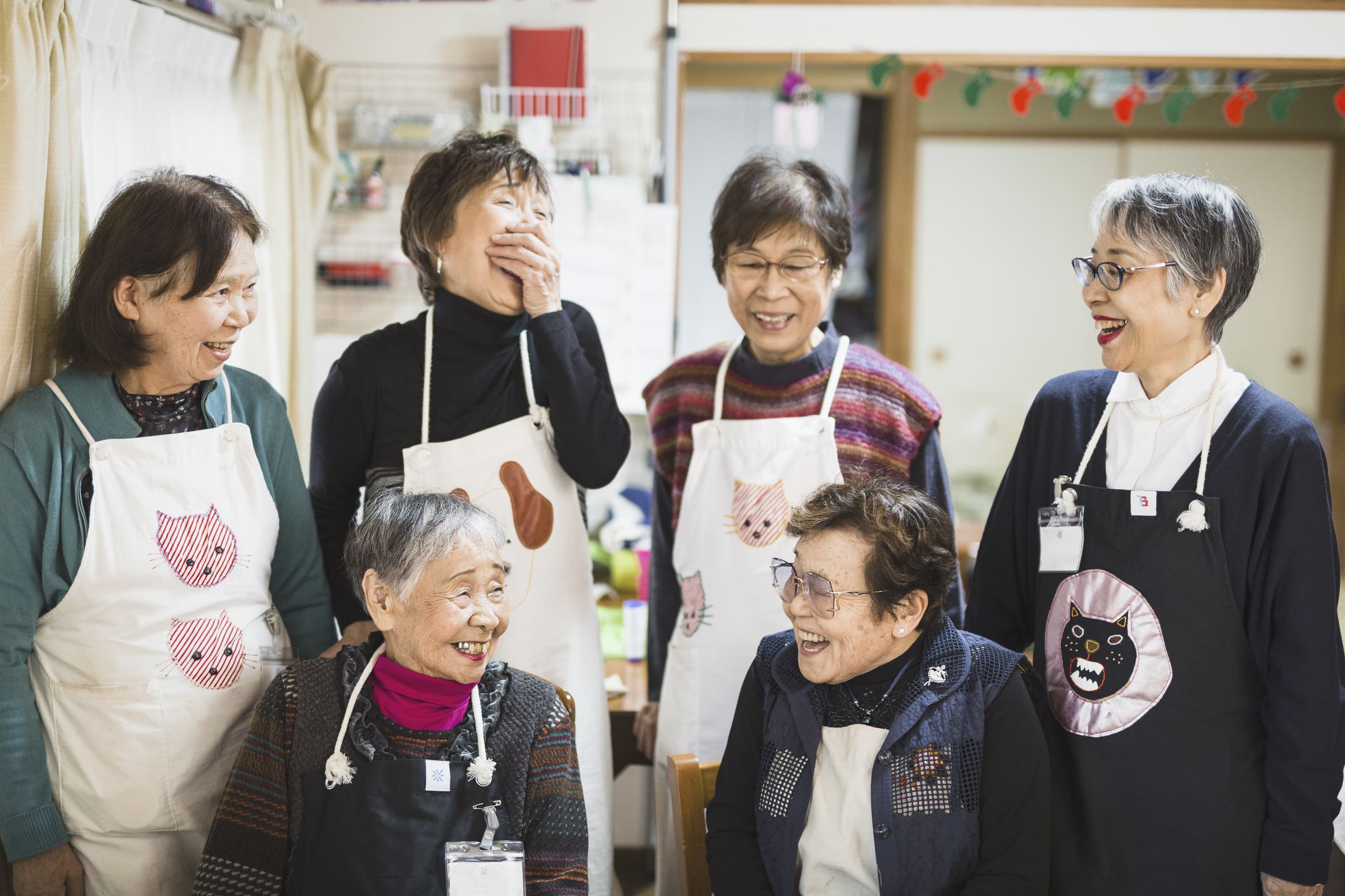 Community of Japanese senior females making handicraft products.