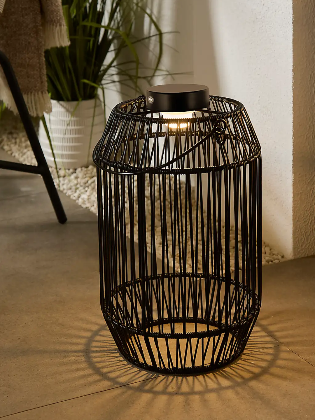 A woven rechargeable lantern from Dunelm