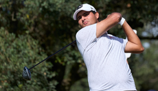 Eugenio Chacarra watches his ball flight off the tee